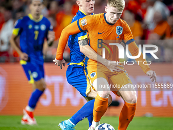 Bosnia and Herzegovina midfielder Benjamin Tahirovic and Netherlands midfielder Jerdy Schouten during the match between the Netherlands and...