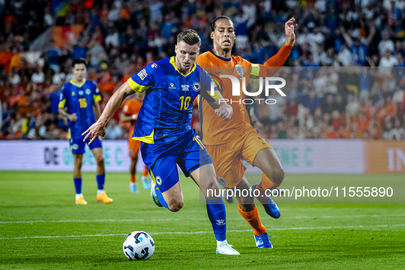 Bosnia and Herzegovina forward Ermedin Demirovic and Netherlands defender Virgil van Dijk during the match between the Netherlands and Bosni...