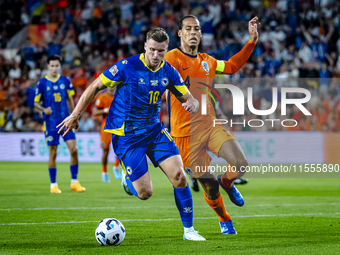 Bosnia and Herzegovina forward Ermedin Demirovic and Netherlands defender Virgil van Dijk during the match between the Netherlands and Bosni...