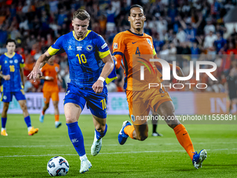 Bosnia and Herzegovina forward Ermedin Demirovic and Netherlands defender Virgil van Dijk during the match between the Netherlands and Bosni...