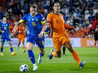 Bosnia and Herzegovina forward Ermedin Demirovic and Netherlands defender Virgil van Dijk during the match between the Netherlands and Bosni...