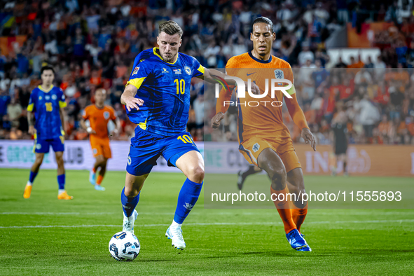 Bosnia and Herzegovina forward Ermedin Demirovic and Netherlands defender Virgil van Dijk during the match between the Netherlands and Bosni...