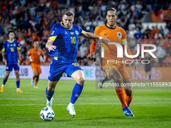 Bosnia and Herzegovina forward Ermedin Demirovic and Netherlands defender Virgil van Dijk during the match between the Netherlands and Bosni...