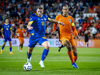 Bosnia and Herzegovina forward Ermedin Demirovic and Netherlands defender Virgil van Dijk during the match between the Netherlands and Bosni...