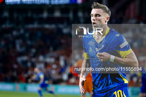 Bosnia and Herzegovina forward Ermedin Demirovic scores the 1-1 and celebrates the goal during the match between the Netherlands and Bosnia...