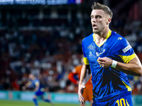 Bosnia and Herzegovina forward Ermedin Demirovic scores the 1-1 and celebrates the goal during the match between the Netherlands and Bosnia...