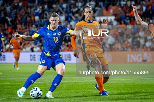 Bosnia and Herzegovina forward Ermedin Demirovic scores the 1-1 during the match between the Netherlands and Bosnia and Herzegovina at the P...