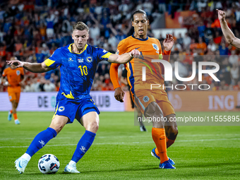 Bosnia and Herzegovina forward Ermedin Demirovic scores the 1-1 during the match between the Netherlands and Bosnia and Herzegovina at the P...