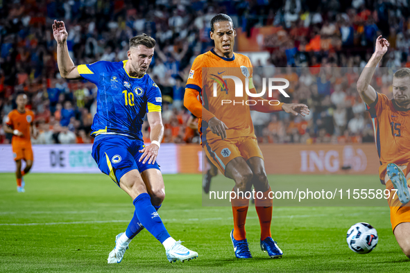 Bosnia and Herzegovina forward Ermedin Demirovic scores the 1-1 during the match between the Netherlands and Bosnia and Herzegovina at the P...