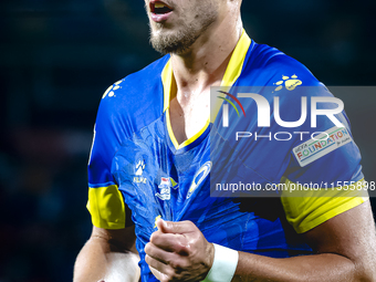 Bosnia and Herzegovina forward Ermedin Demirovic scores the 1-1 and celebrates the goal during the match between the Netherlands and Bosnia...