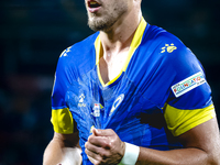 Bosnia and Herzegovina forward Ermedin Demirovic scores the 1-1 and celebrates the goal during the match between the Netherlands and Bosnia...