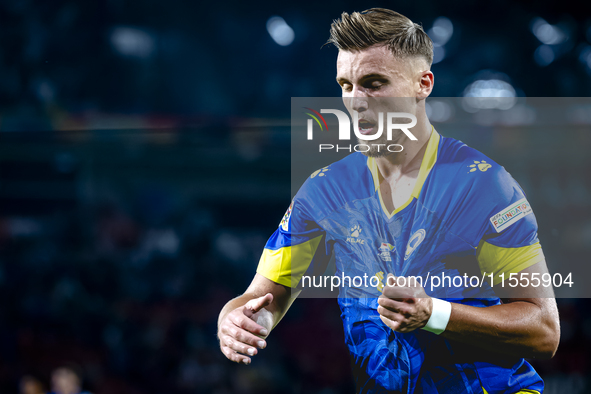 Bosnia and Herzegovina forward Ermedin Demirovic scores the 1-1 and celebrates the goal during the match between the Netherlands and Bosnia...