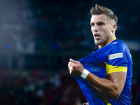 Bosnia and Herzegovina forward Ermedin Demirovic scores the 1-1 and celebrates the goal during the match between the Netherlands and Bosnia...