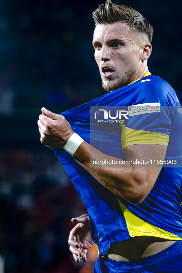 Bosnia and Herzegovina forward Ermedin Demirovic scores the 1-1 and celebrates the goal during the match between the Netherlands and Bosnia...