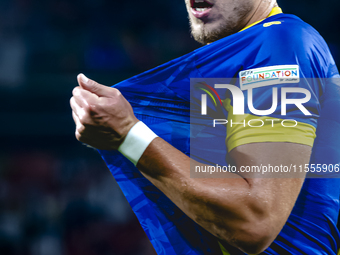 Bosnia and Herzegovina forward Ermedin Demirovic scores the 1-1 and celebrates the goal during the match between the Netherlands and Bosnia...