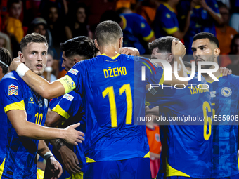 Bosnia and Herzegovina forward Ermedin Demirovic scores the 1-1 and celebrates the goal during the match between the Netherlands and Bosnia...