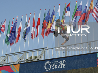 Athletes skate during the final day of Skate Vert at the World Skate Games in Rome, Italy, on September 7, 2024. (