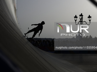 Athletes skate during the final day of Skate Vert at the World Skate Games in Rome, Italy, on September 7, 2024. (