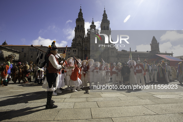 The annual parade of traditional costumes for the entroido, as the carnival is known in Galicia, takes place through the streets of Santiago...