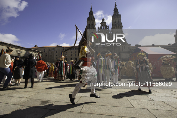 The annual parade of traditional costumes for the entroido, as the carnival is known in Galicia, takes place through the streets of Santiago...