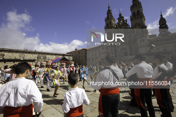 The annual parade of traditional costumes for the entroido, as the carnival is known in Galicia, takes place through the streets of Santiago...