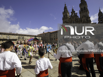 The annual parade of traditional costumes for the entroido, as the carnival is known in Galicia, takes place through the streets of Santiago...