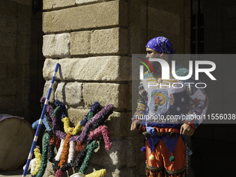 The annual parade of traditional costumes for the entroido, as the carnival is known in Galicia, takes place through the streets of Santiago...