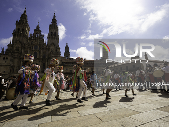 The annual parade of traditional costumes for the entroido, as the carnival is known in Galicia, takes place through the streets of Santiago...