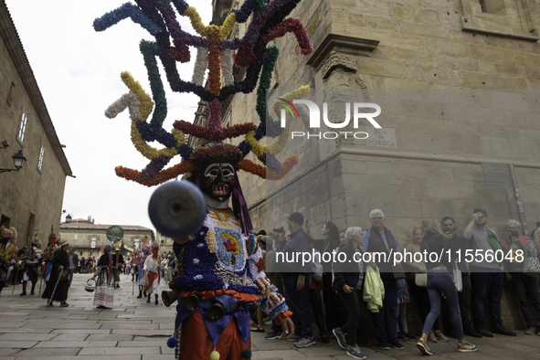 The annual parade of traditional costumes for the entroido, as the carnival is known in Galicia, takes place through the streets of Santiago...