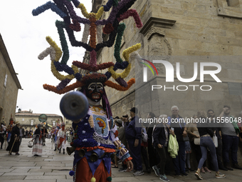 The annual parade of traditional costumes for the entroido, as the carnival is known in Galicia, takes place through the streets of Santiago...