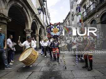 The annual parade of traditional costumes for the entroido, as the carnival is known in Galicia, takes place through the streets of Santiago...