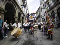 The annual parade of traditional costumes for the entroido, as the carnival is known in Galicia, takes place through the streets of Santiago...