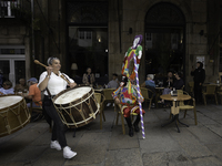 The annual parade of traditional costumes for the entroido, as the carnival is known in Galicia, takes place through the streets of Santiago...