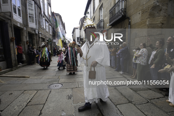 The annual parade of traditional costumes for the entroido, as the carnival is known in Galicia, takes place through the streets of Santiago...