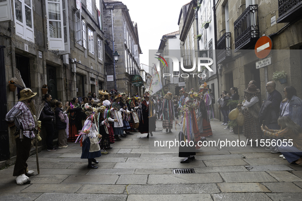 The annual parade of traditional costumes for the entroido, as the carnival is known in Galicia, takes place through the streets of Santiago...