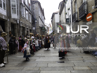 The annual parade of traditional costumes for the entroido, as the carnival is known in Galicia, takes place through the streets of Santiago...