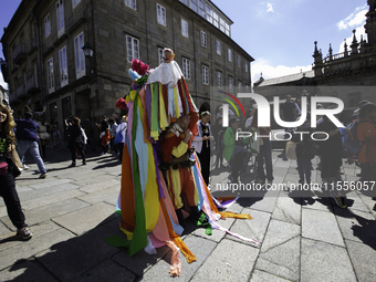 The annual parade of traditional costumes for the entroido, as the carnival is known in Galicia, takes place through the streets of Santiago...