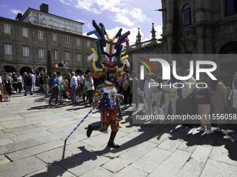 The annual parade of traditional costumes for the entroido, as the carnival is known in Galicia, takes place through the streets of Santiago...