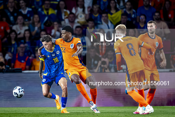 Bosnia and Herzegovina midfielder Denis Huseinbasic and Netherlands defender Denzel Dumfries during the match between the Netherlands and Bo...