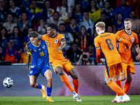 Bosnia and Herzegovina midfielder Denis Huseinbasic and Netherlands defender Denzel Dumfries during the match between the Netherlands and Bo...