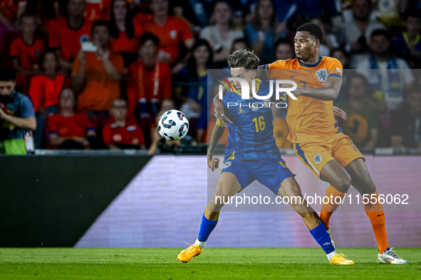 Bosnia and Herzegovina midfielder Denis Huseinbasic and Netherlands defender Denzel Dumfries during the match between the Netherlands and Bo...