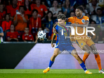 Bosnia and Herzegovina midfielder Denis Huseinbasic and Netherlands defender Denzel Dumfries during the match between the Netherlands and Bo...