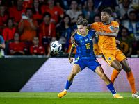 Bosnia and Herzegovina midfielder Denis Huseinbasic and Netherlands defender Denzel Dumfries during the match between the Netherlands and Bo...