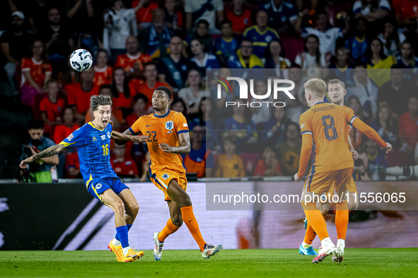 Bosnia and Herzegovina midfielder Denis Huseinbasic and Netherlands defender Denzel Dumfries during the match between the Netherlands and Bo...