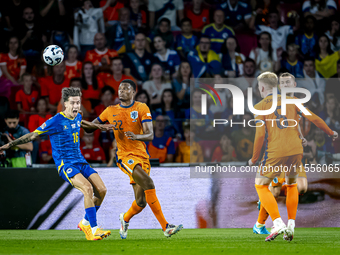 Bosnia and Herzegovina midfielder Denis Huseinbasic and Netherlands defender Denzel Dumfries during the match between the Netherlands and Bo...