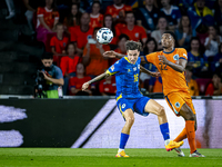 Bosnia and Herzegovina midfielder Denis Huseinbasic and Netherlands defender Denzel Dumfries during the match between the Netherlands and Bo...