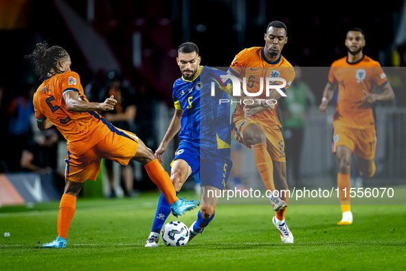 Netherlands midfielder Ryan Gravenberch and Bosnia and Herzegovina defender Adrian Leon Barisic during the match between the Netherlands and...