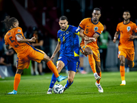 Netherlands midfielder Ryan Gravenberch and Bosnia and Herzegovina defender Adrian Leon Barisic during the match between the Netherlands and...