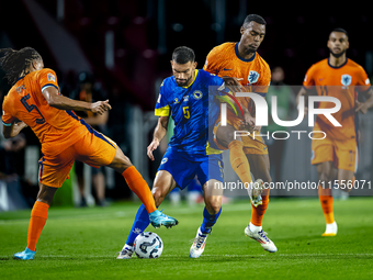 Netherlands midfielder Ryan Gravenberch and Bosnia and Herzegovina defender Adrian Leon Barisic during the match between the Netherlands and...