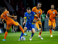 Netherlands midfielder Ryan Gravenberch and Bosnia and Herzegovina defender Adrian Leon Barisic during the match between the Netherlands and...